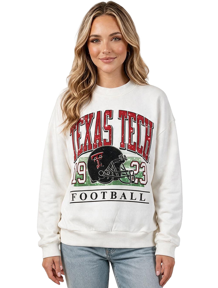 Model wearing the Texas Tech Full Rhinestone Helmet on Field white crewneck sweatshirt