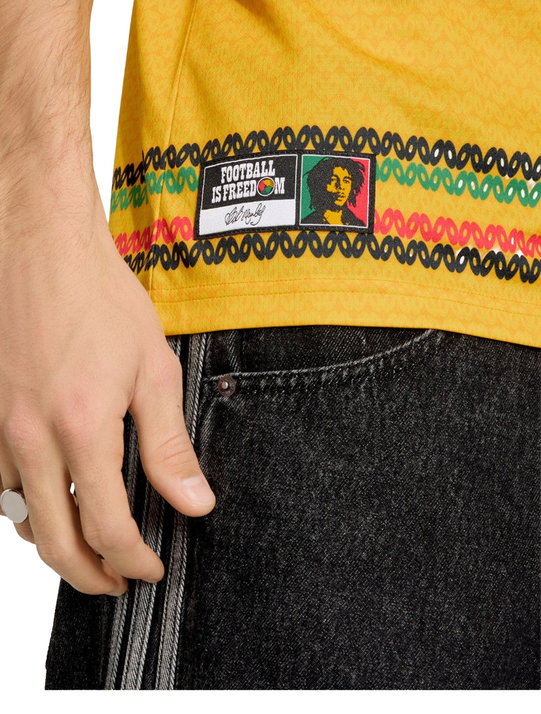 Shoulder stripe and trim detail on Adidas Jamaica 26 x Bob Marley Home Jersey