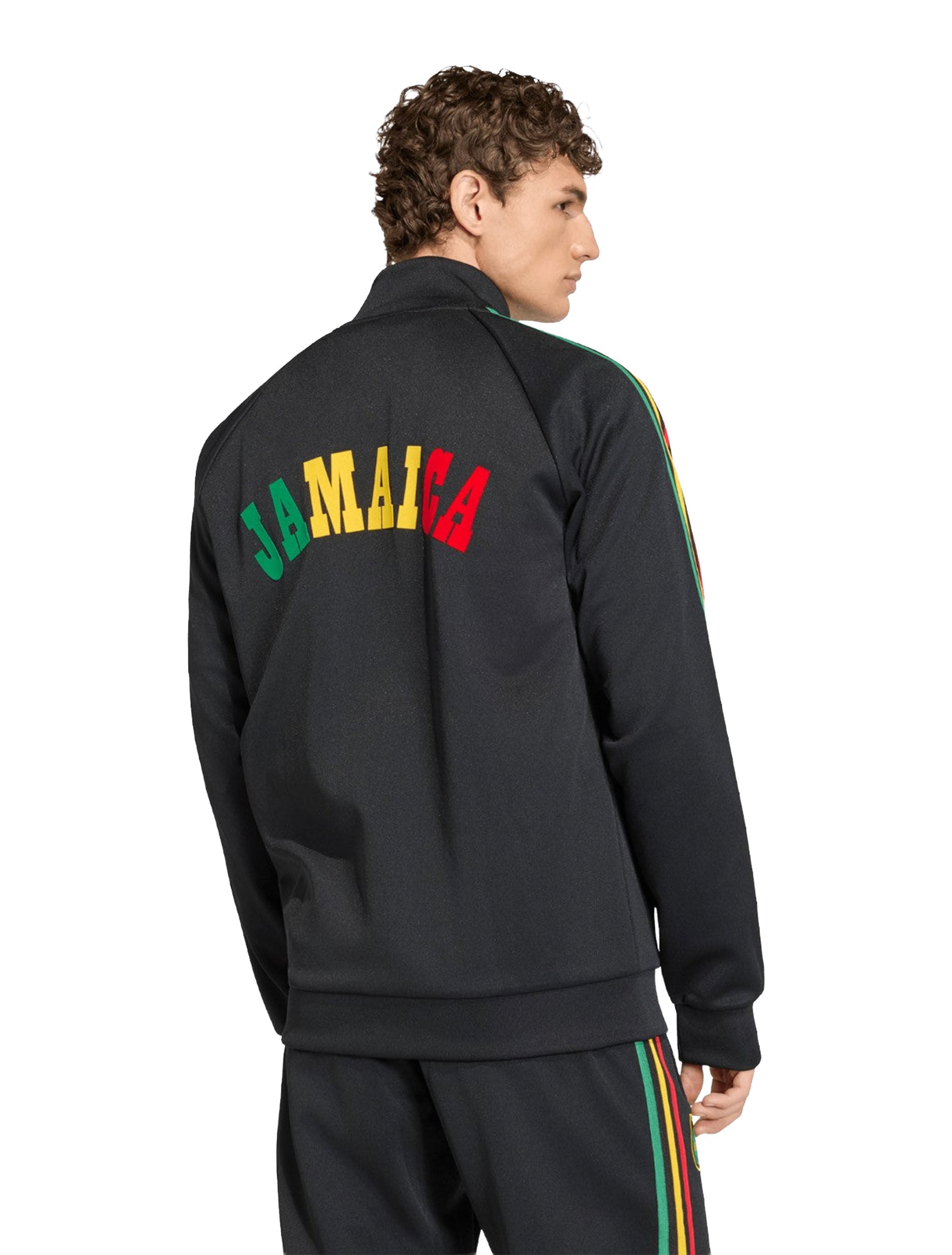 Adidas Jamaica x Bob Marley Originals Track Jacket in Black styled with black denim — full body