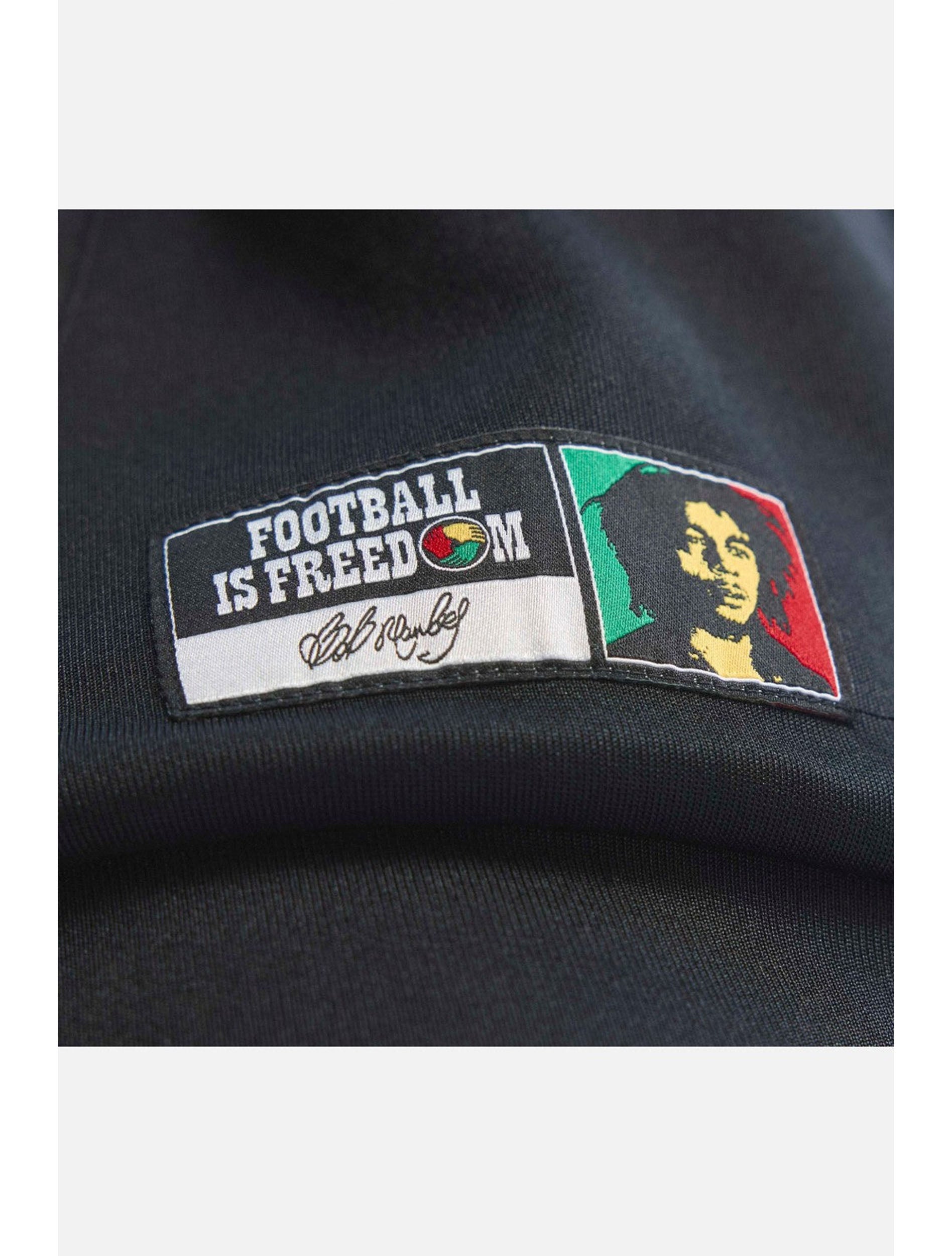 Zipper and front closure detail on Adidas Jamaica x Bob Marley Track Jacket