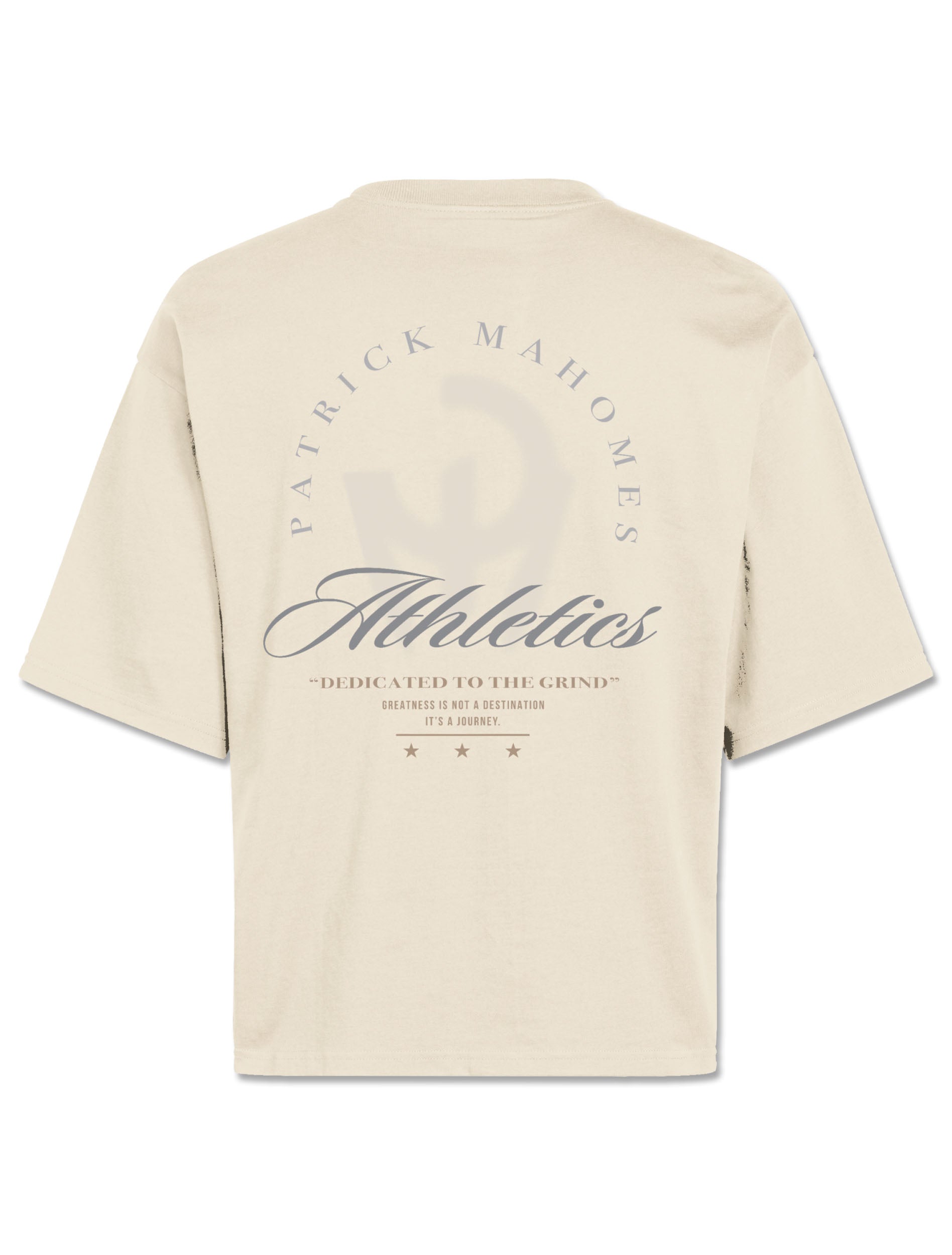 Back of the ivory boxy tee with PATRICK MAHOMES arched over Athletics script and Dedicated to the Grind