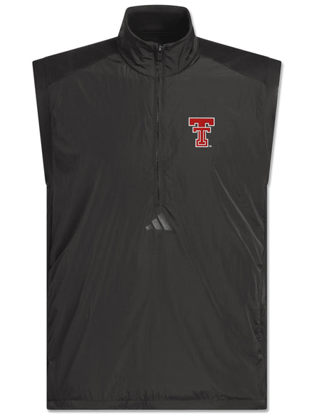 Black Adidas half-zip golf vest with an embroidered red throwback Double T on the left chest and a tonal Adidas logo below the zip