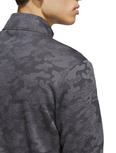 Close-up of the grey and black camo jacquard knit at the collar and shoulder