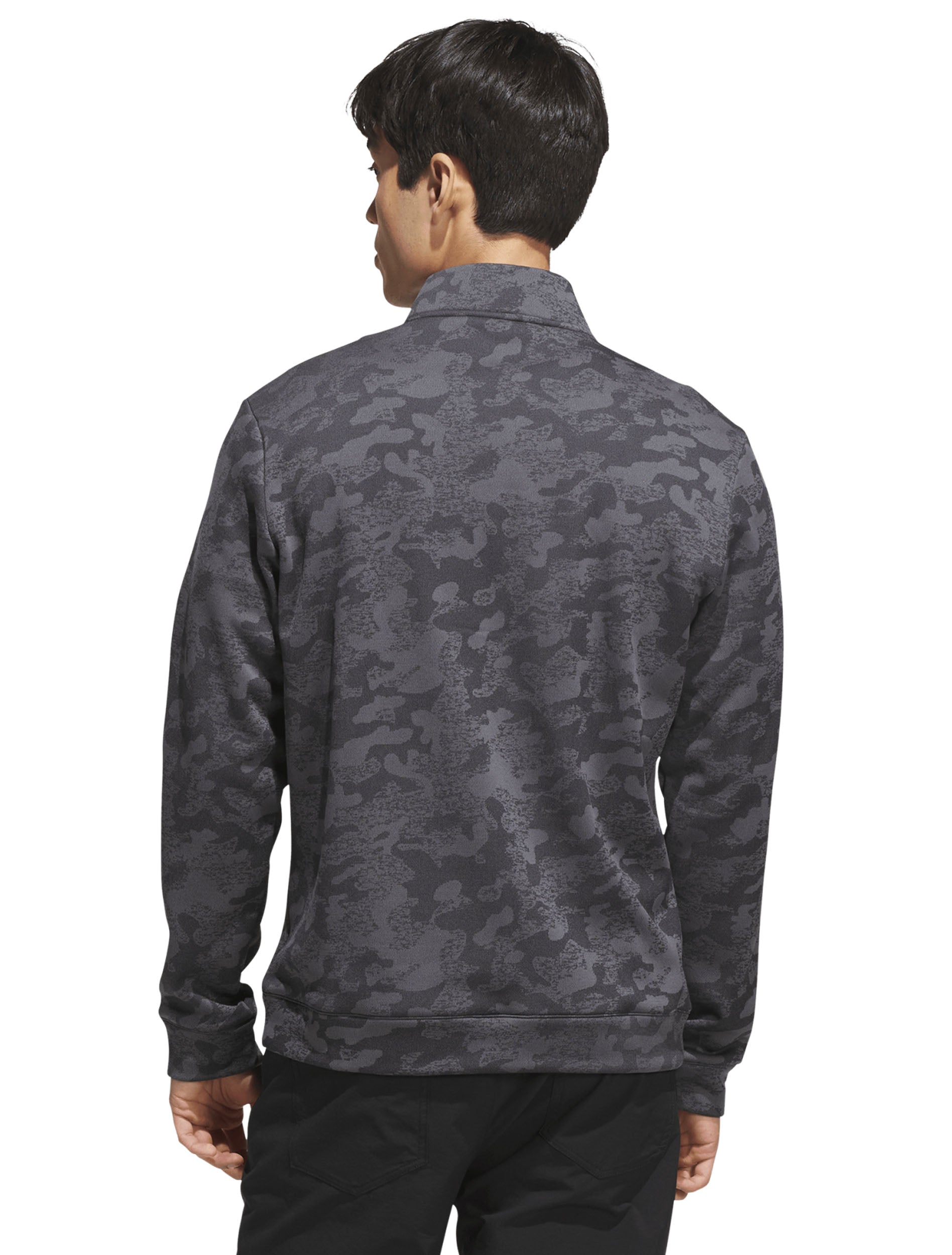Back of the tonal camo golf quarter zip on a model
