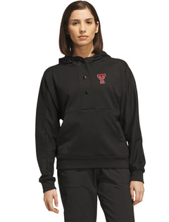 Model wearing the black Adidas women's golf hoodie, front view