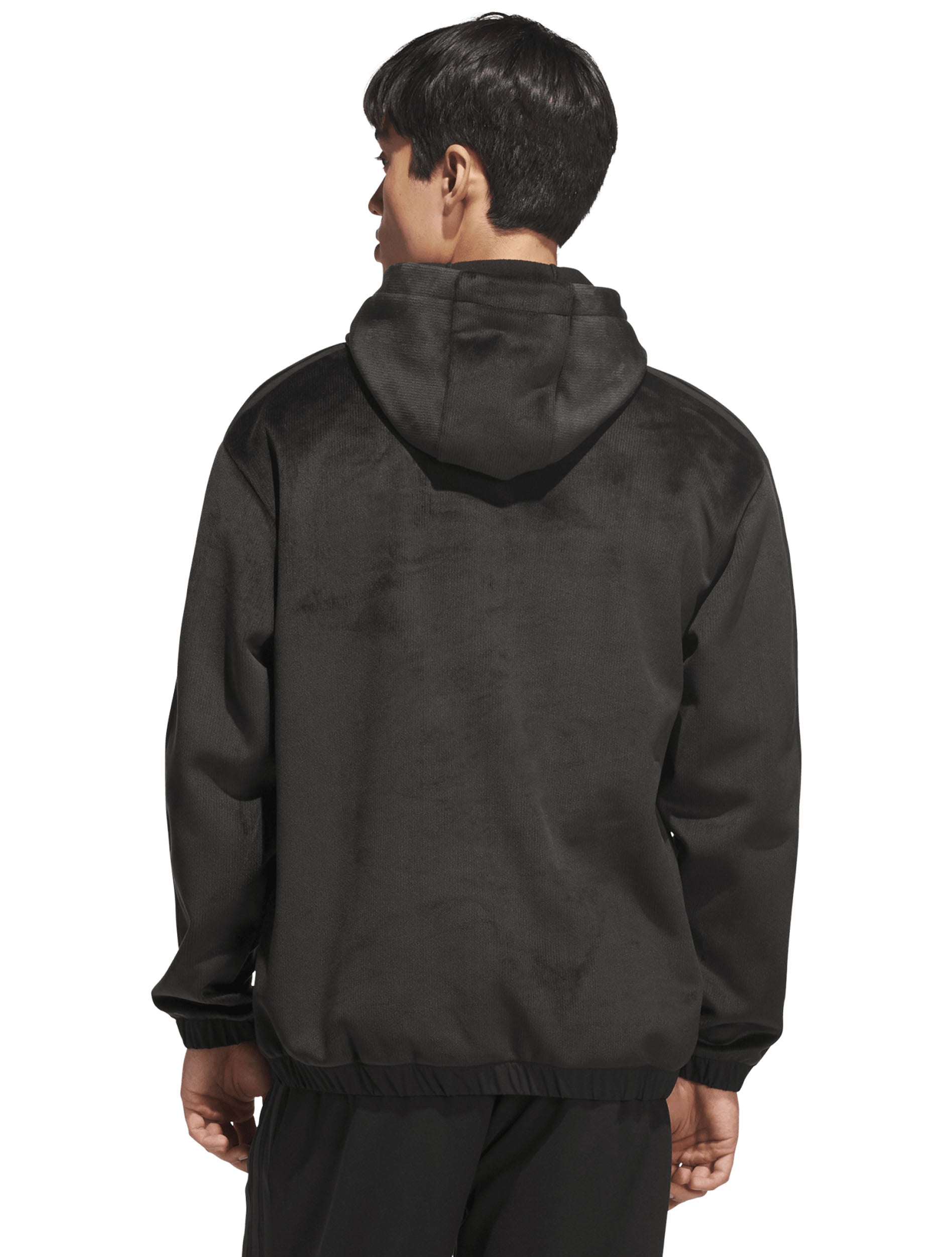 Model wearing the black Adidas Lido plush quarter-zip golf hood, back view