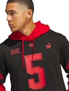 Model wearing the black Texas Tech hooded jersey, close view of the red hood, the number 5 and the chest marks