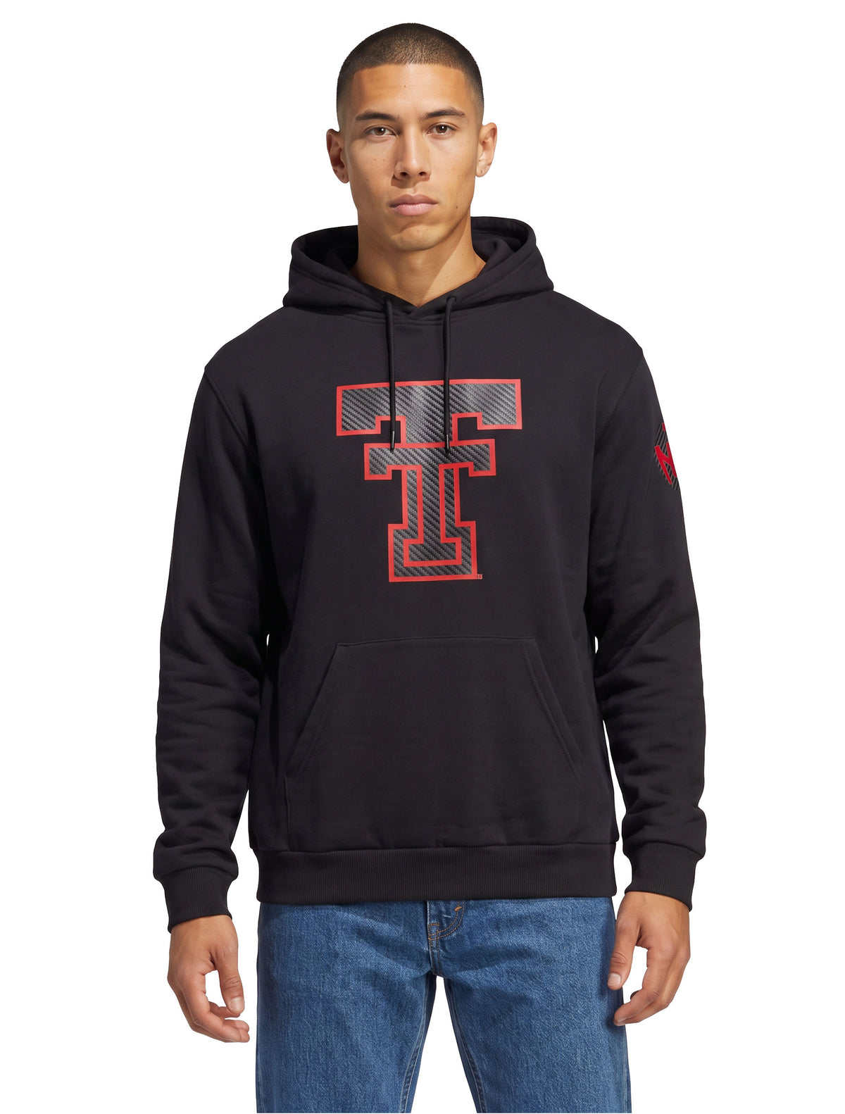 Model wearing the black Texas Tech hoodie with the large carbon Double T at the chest, styled with denim