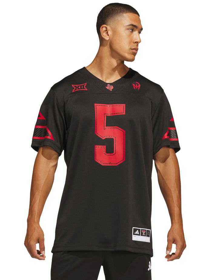 Model wearing the black Texas Tech Mahomes jersey, front view with the red number 5 on the chest