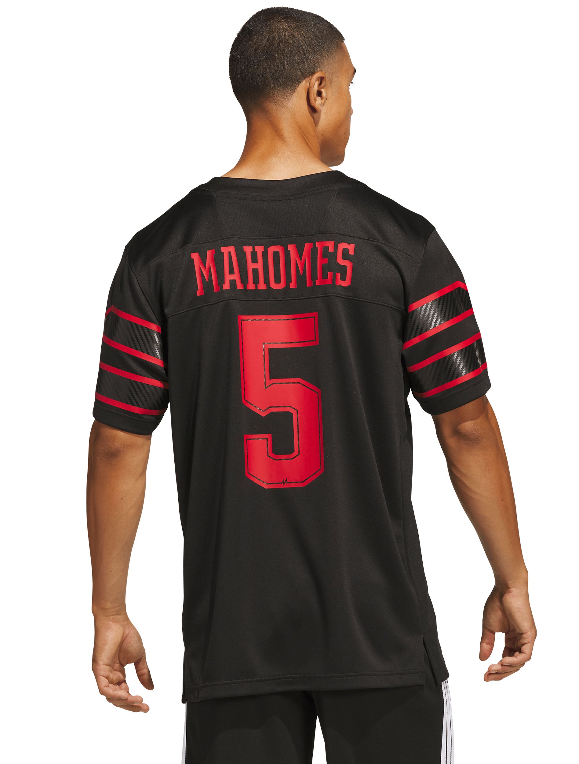 Model wearing the black Texas Tech Mahomes jersey, back view showing MAHOMES and the number 5