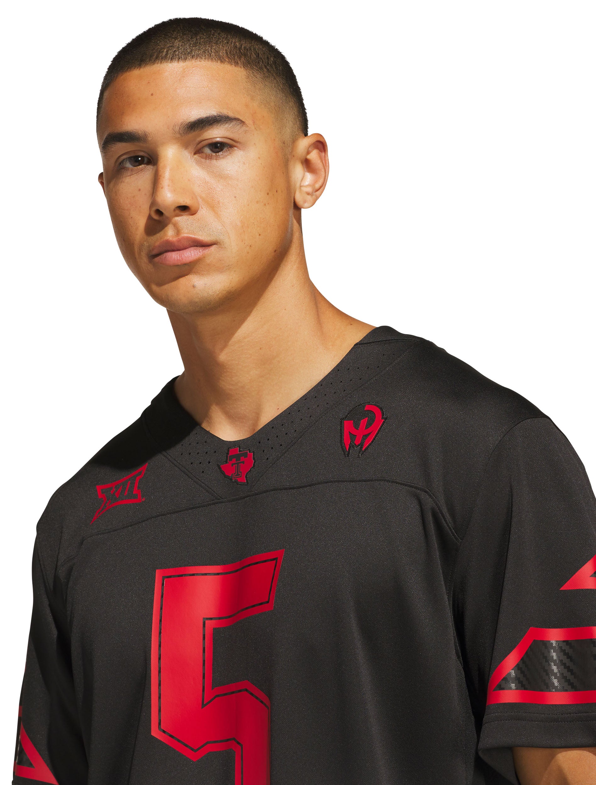 Close up of the adidas and Double T jock tag with a player ID panel at the front hem of the jersey