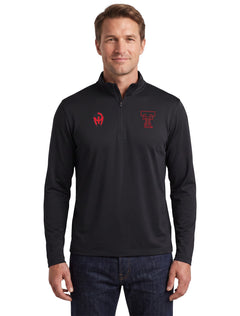 Model wearing the black Texas Tech long sleeve quarter zip, front view with the Mahomes Gladiator logo and Double T at the chest