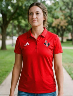 Lifestyle model of woman wearing the Red Texas Tech Lonestar Pride Adidas Sideline Polo