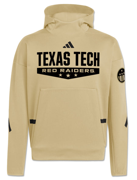 Front view of a black Texas Tech Red Raiders chevron graphic on a tan Adidas Honor & Support Z.N.E. pullover hoodie