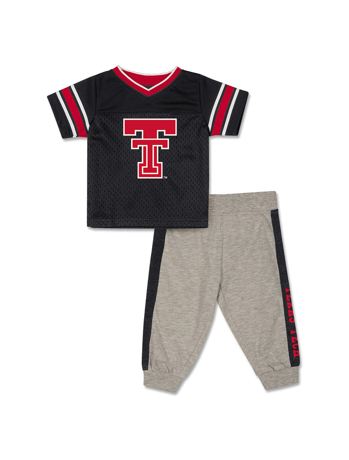 Black Texas Tech infant mesh football jersey with a red Double T and striped sleeves, shown with heather grey joggers with black side panels and TEXAS TECH down the leg