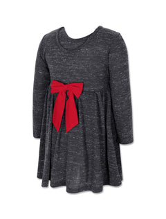 Back view of a black speckled Arena Texas Tech toddler dress with a red bow tied at the waist