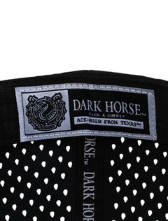 Inside detail of the Texas Tech 806 black rope cap showing the Dark Horse Tack and Supply woven label