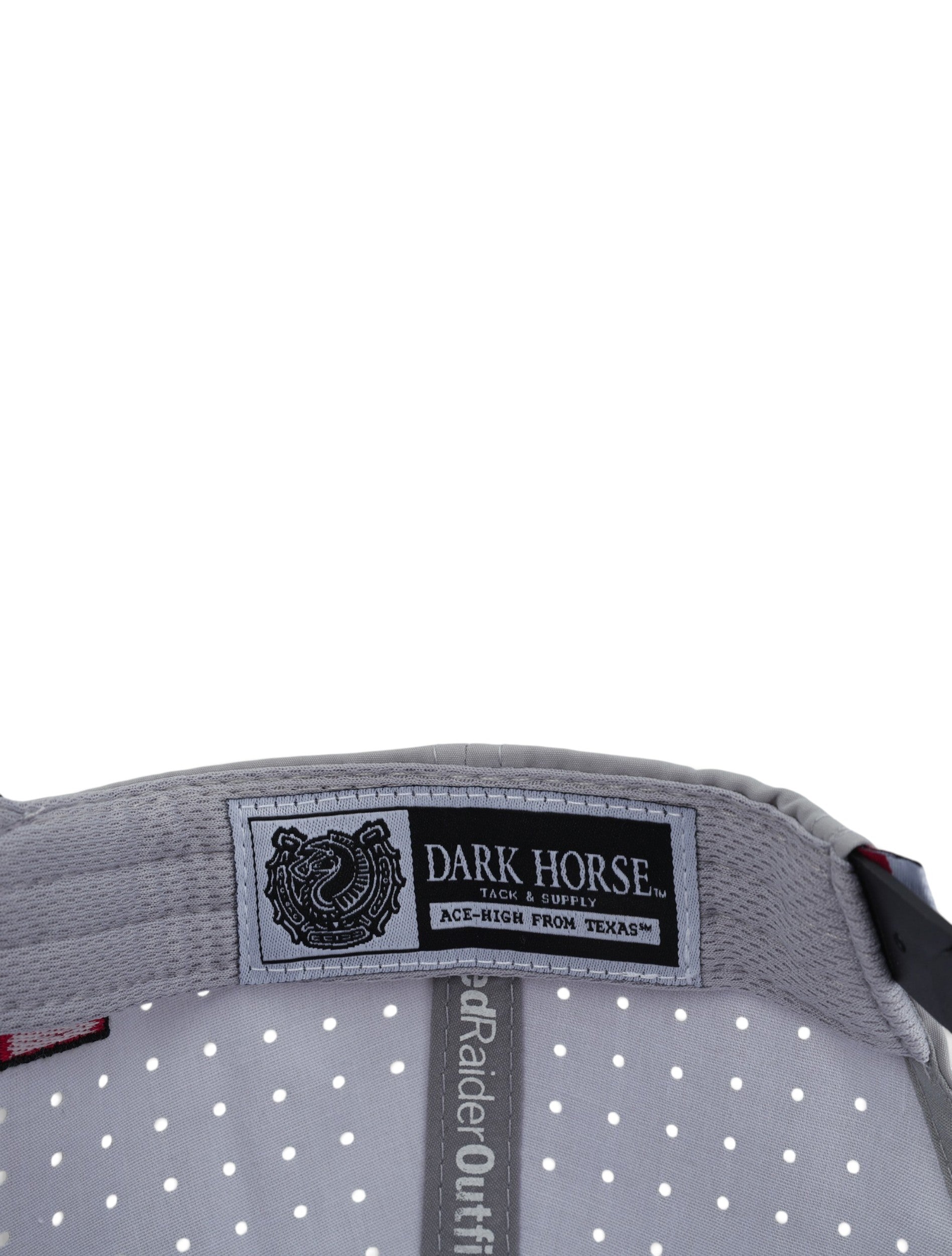 Inside the grey Texas Tech cap showing the Dark Horse Tack and Supply label on the sweatband