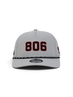 Front of the grey Texas Tech youth cap showing 806 in black with a red outline above a black and white rope