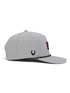 Opposite side of the grey Texas Tech youth cap showing the Dark Horse horseshoe on the panel