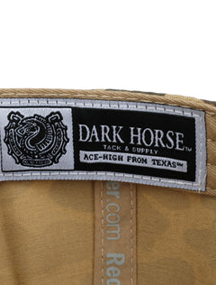 Inside the camo Texas Tech cap showing the Dark Horse Tack and Supply label on the sweatband