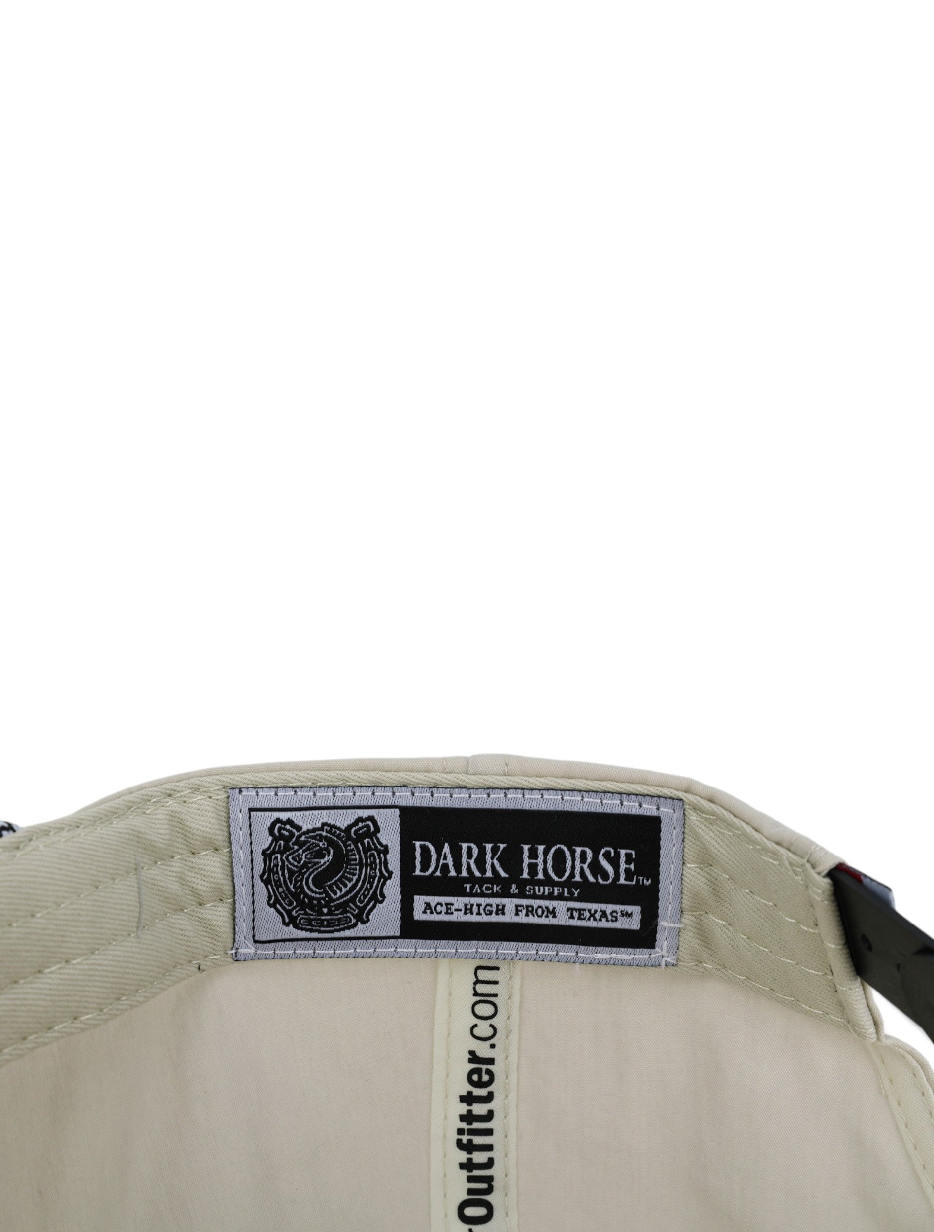 Inside the tan Texas Tech cap showing the Dark Horse Tack and Supply label on the sweatband
