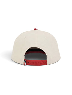 Back of the cream youth Texas Tech cap showing the red snapback strap and the Texas flag tab