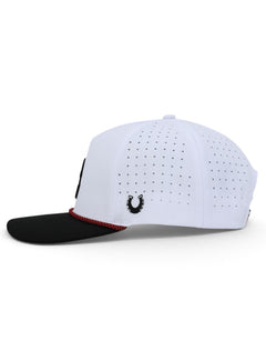 Side of the white Texas Tech cap showing the Dark Horse horseshoe and the laser cut perforations