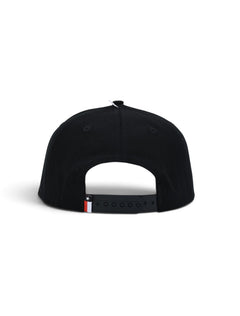 Back of the black youth Texas Tech cap showing the black snapback strap and the Texas flag tab