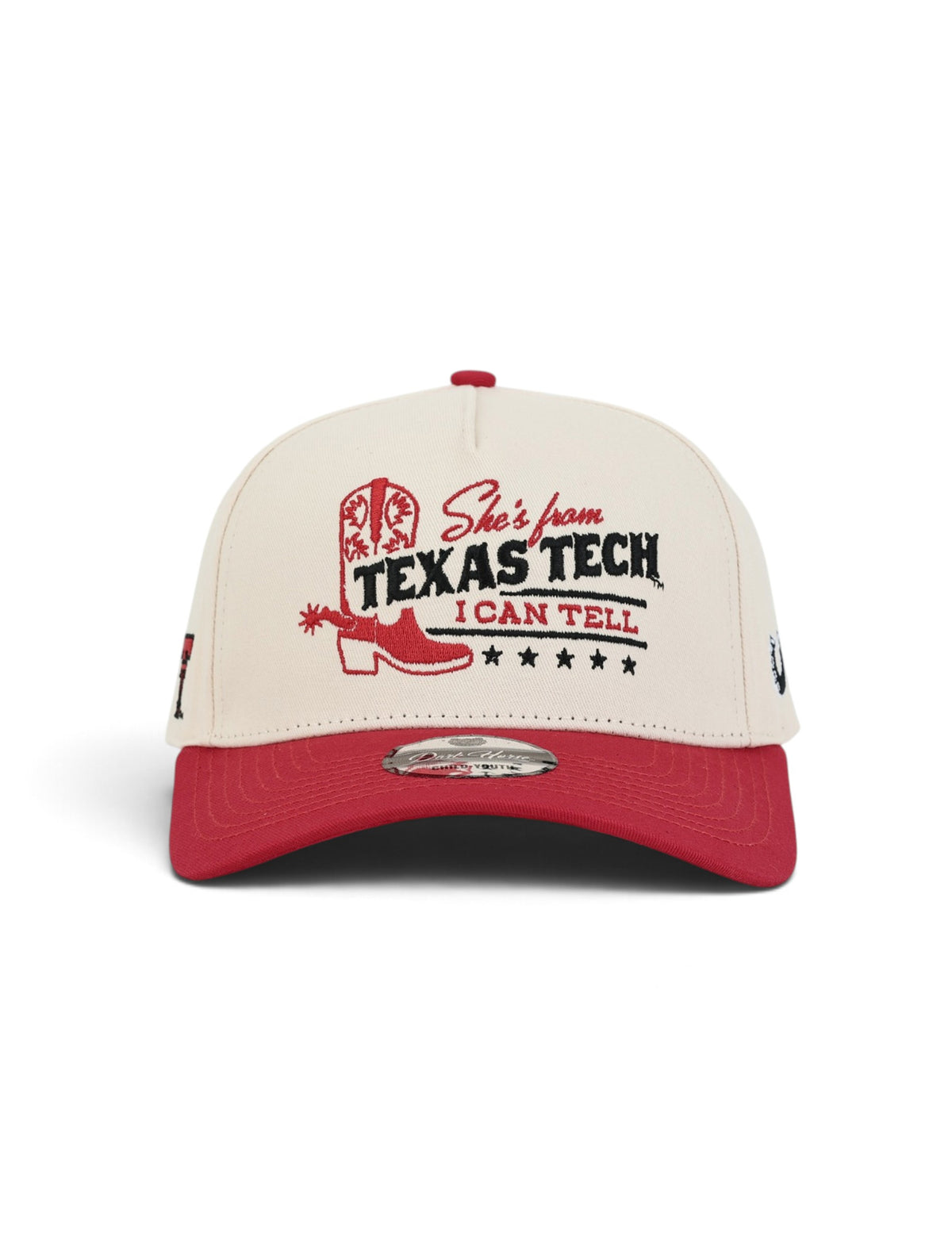 Front of the cream youth Texas Tech cap showing a red cowboy boot and spur beside She's from Texas Tech, I Can Tell in red and black with five stars beneath