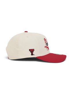 Right side of the cream youth Texas Tech cap showing the Double T on the side panel above the red brim