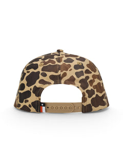Back of the camo Texas Tech cap showing the embroidered eyelets, the snapback strap and the Texas flag tab