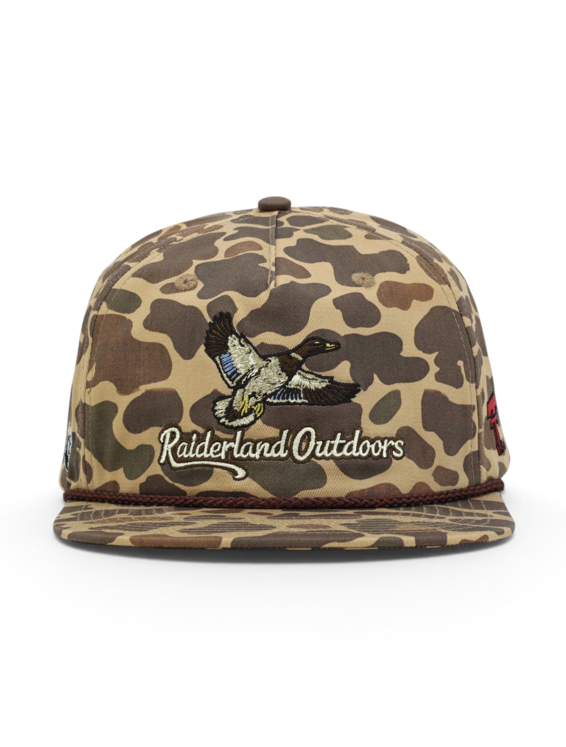 Front of the camo Texas Tech cap showing the mallard over Raiderland Outdoors script above a maroon rope