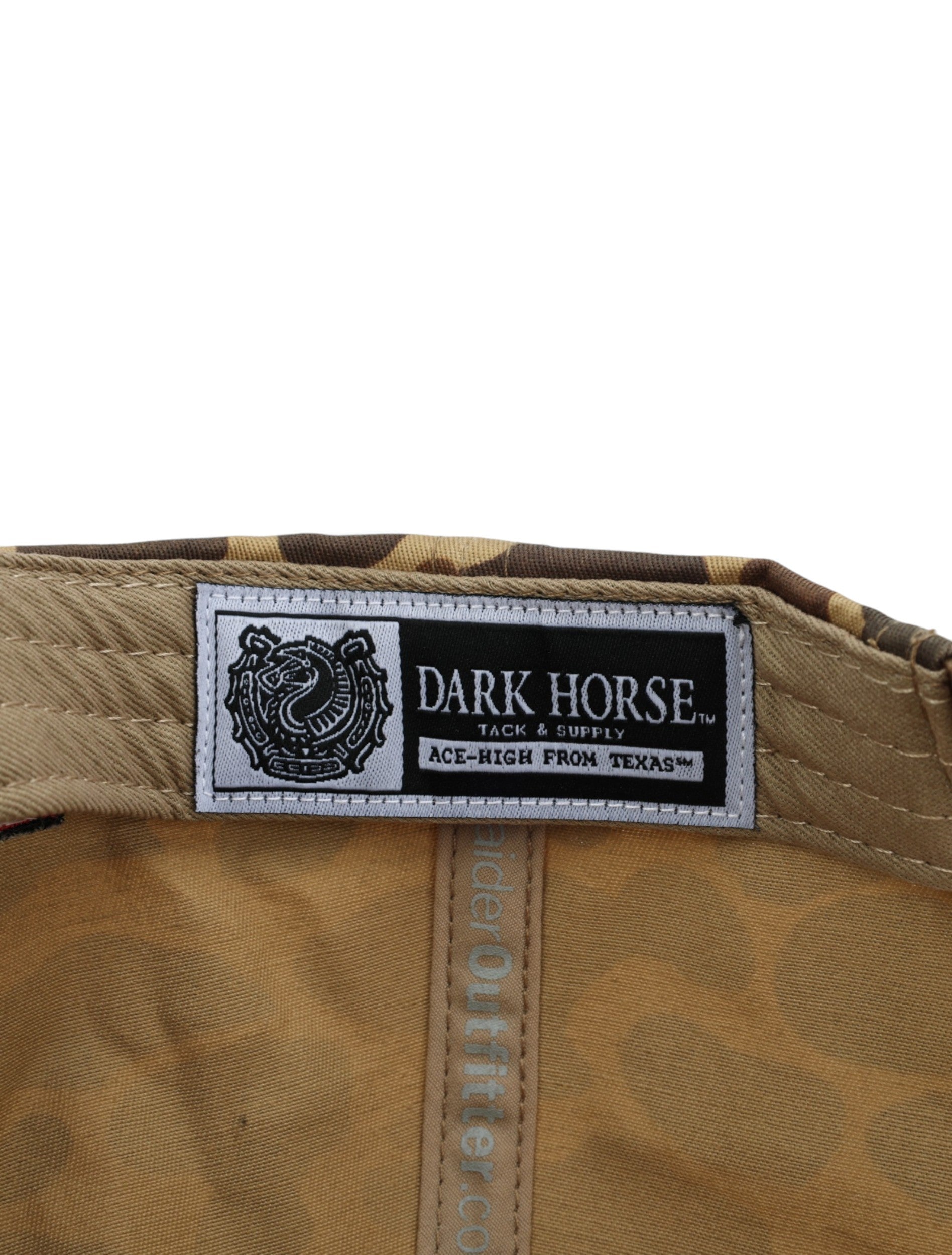 Inside the camo Texas Tech cap showing the Dark Horse Tack and Supply label on the sweatband