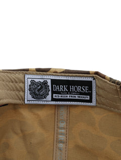 Inside the camo Texas Tech cap showing the Dark Horse Tack and Supply label on the sweatband