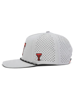Left side of the grey Texas Tech Matadors cap showing the Double T and the laser cut perforations