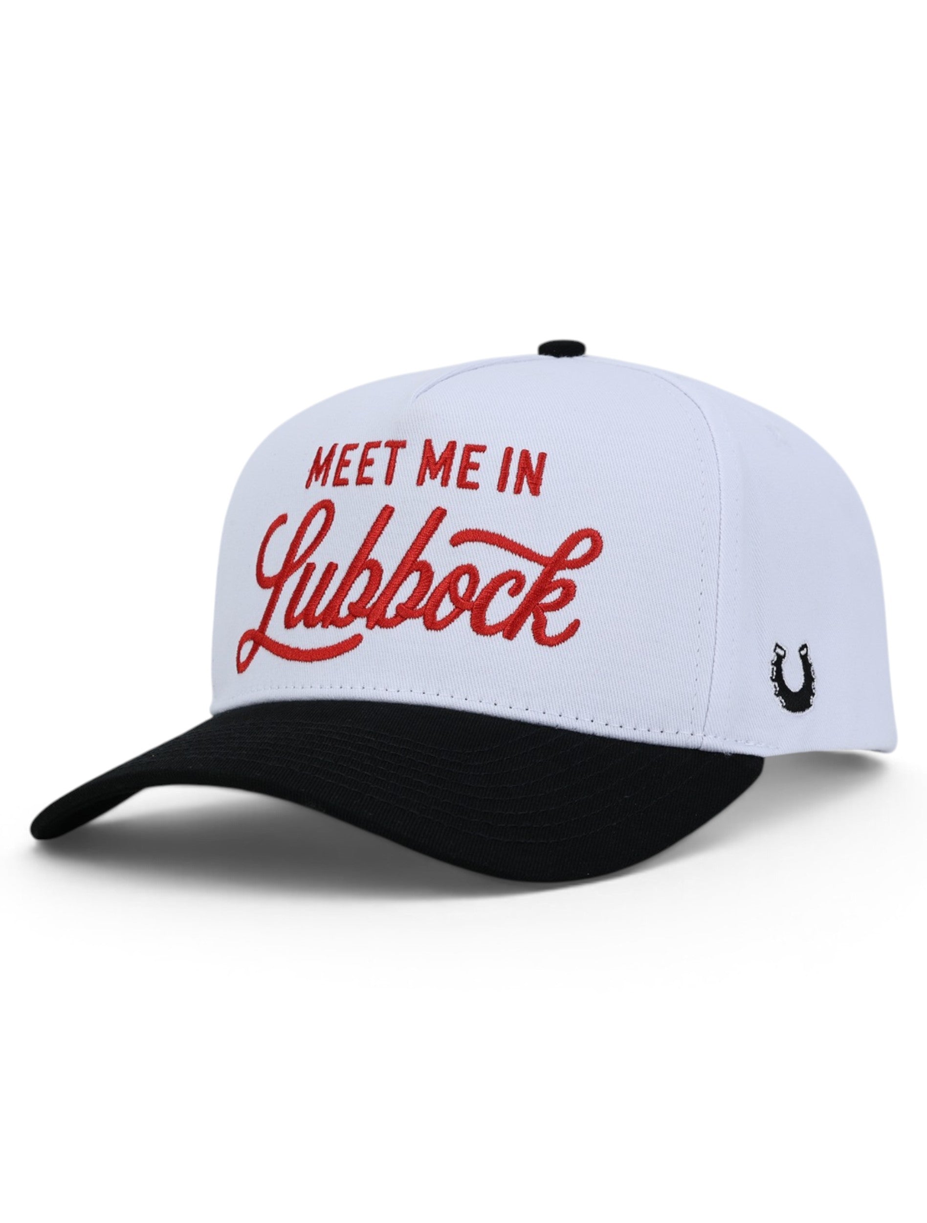 White Texas Tech snapback cap at an angle, with Meet Me In Lubbock in red across the front and a black brim