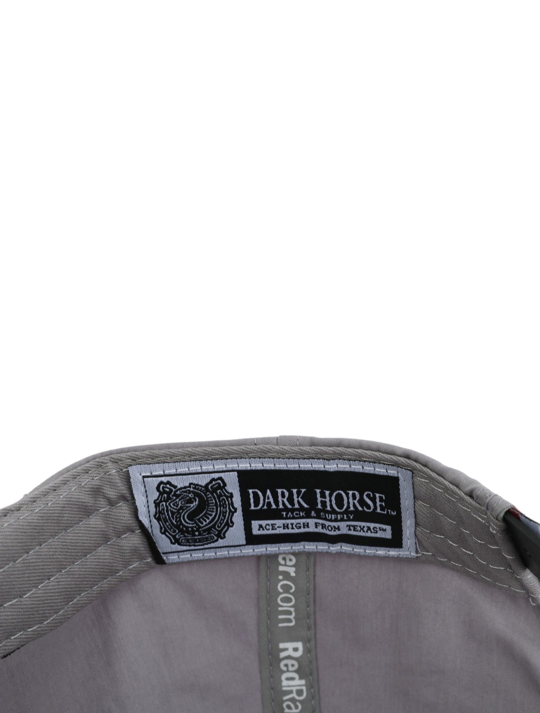 Inside the grey Texas Tech cap showing the Dark Horse Tack and Supply label on the sweatband