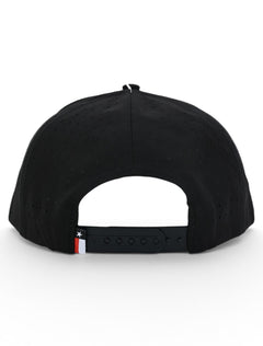 Back of the black Texas Tech cap showing the laser cut perforations, the snapback strap and the Texas flag tab