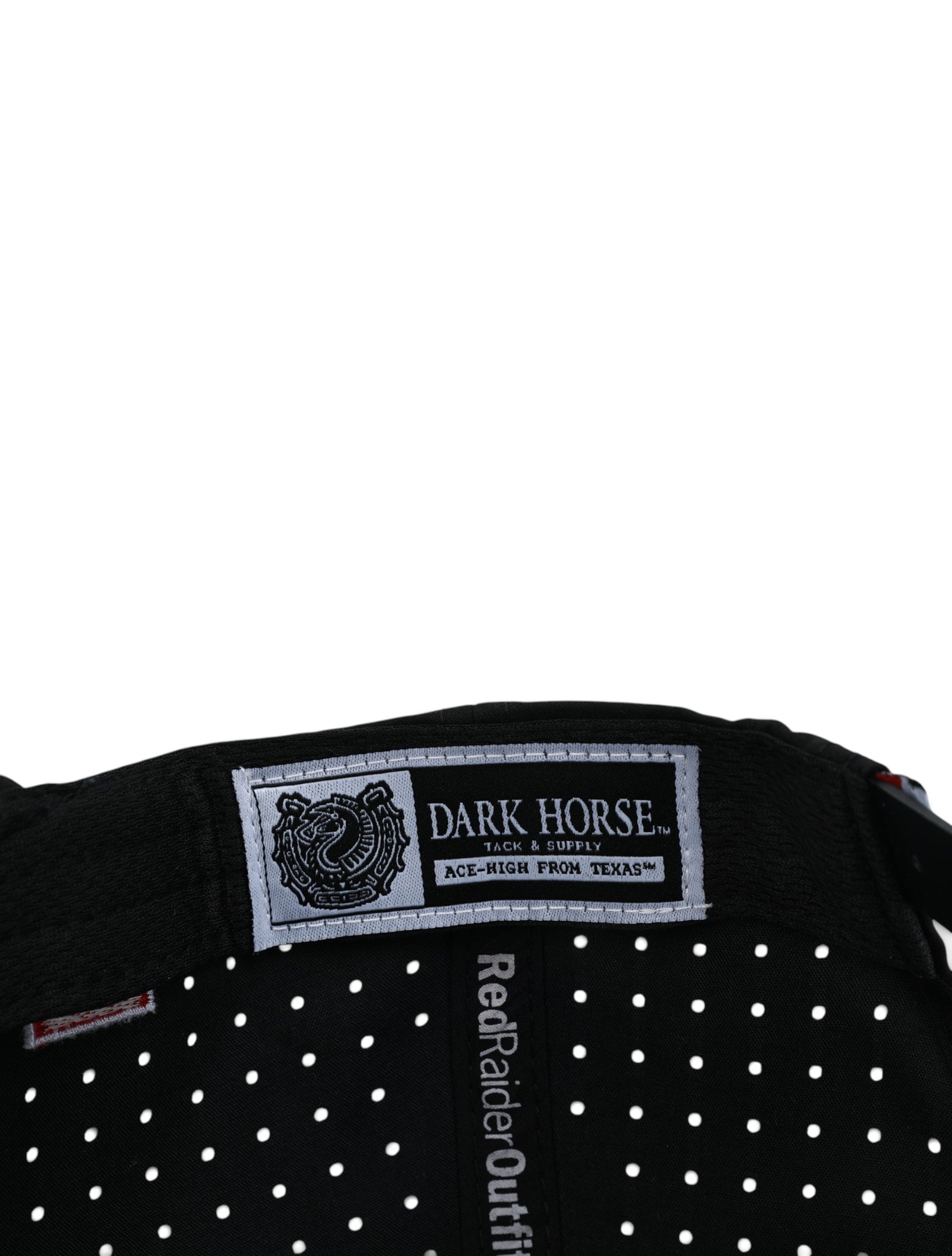 Inside the black Texas Tech cap showing the Dark Horse Tack and Supply label on the sweatband