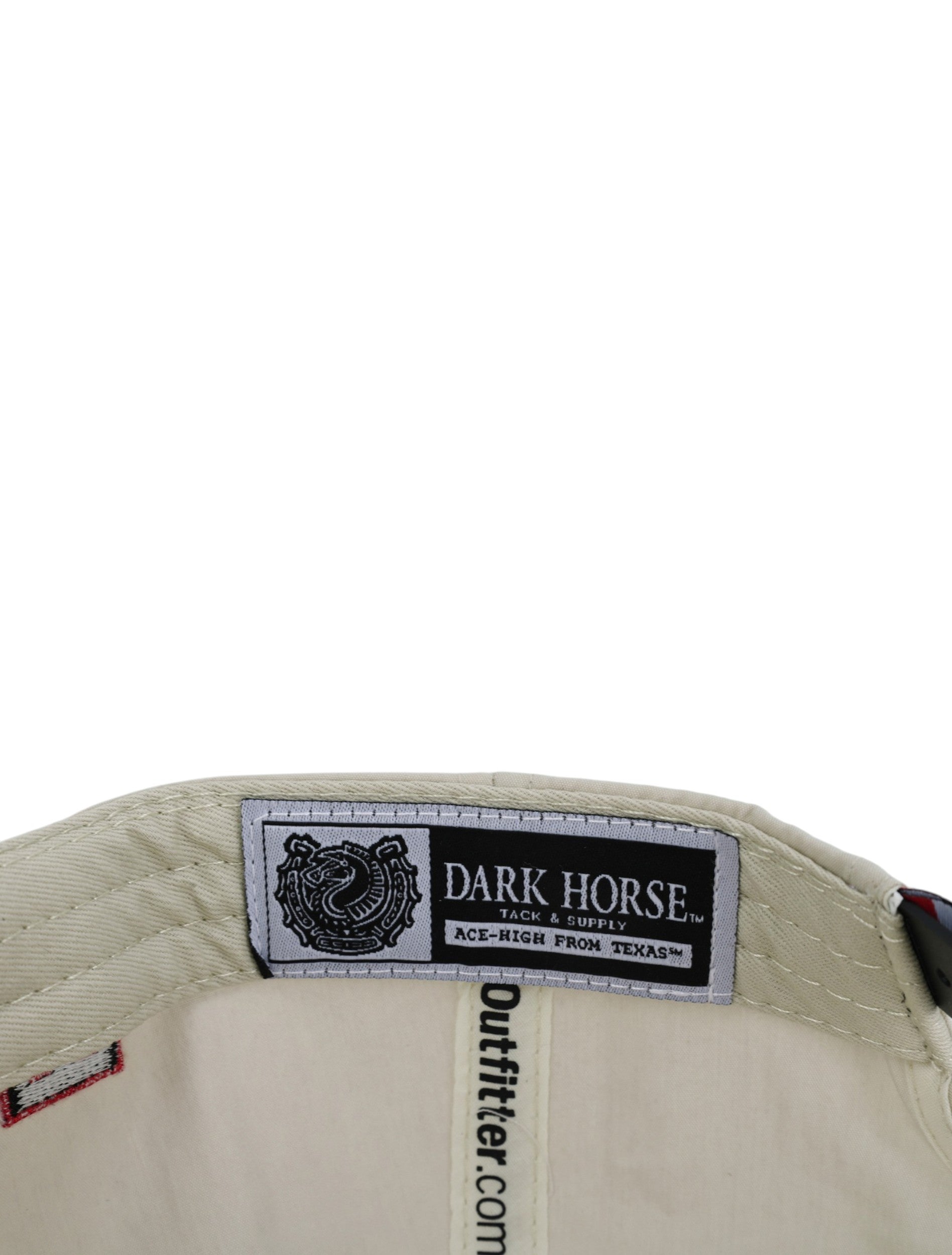 Inside the tan Texas Tech cap showing the Dark Horse Tack and Supply label on the sweatband