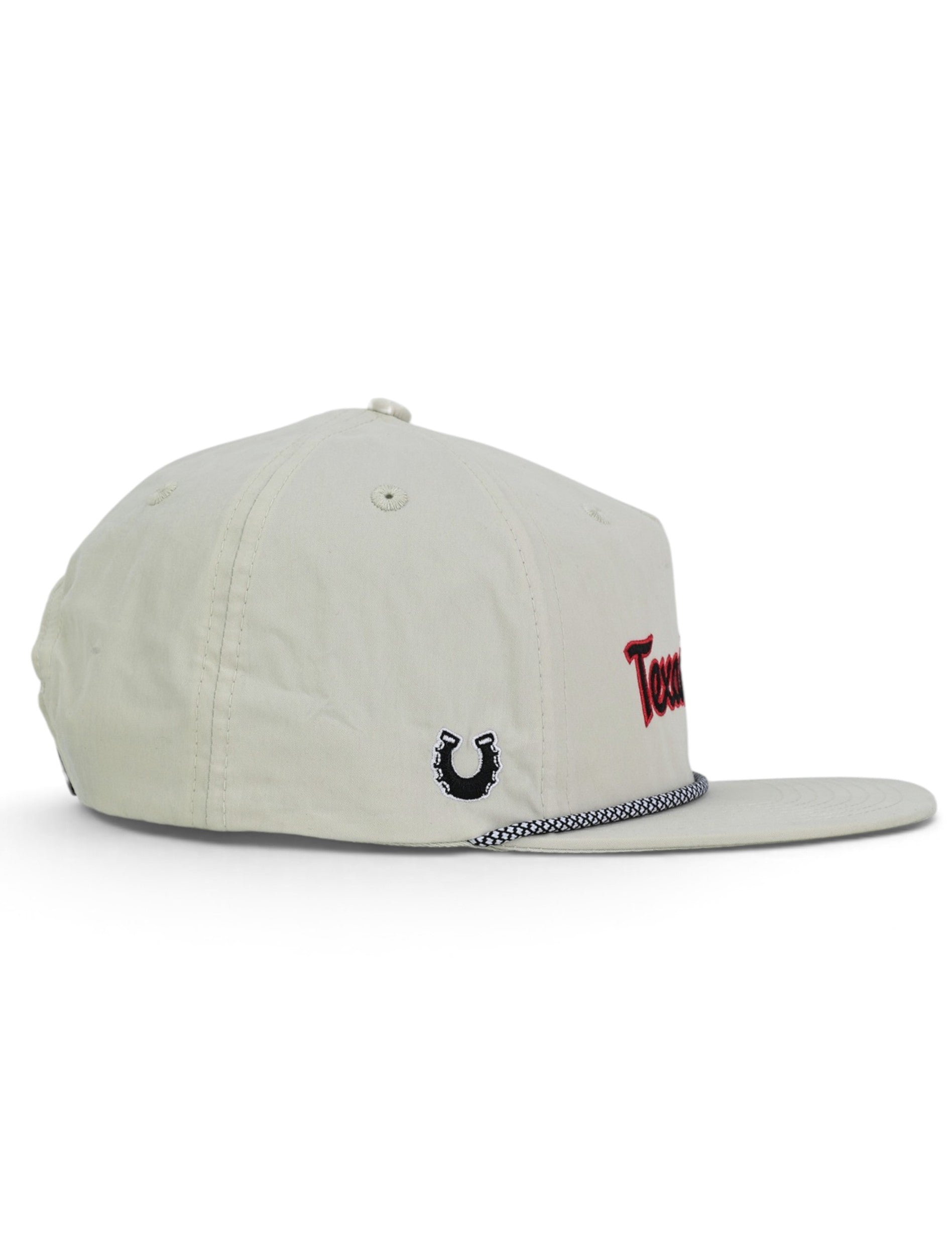 Opposite side of the tan Texas Tech cap showing the Dark Horse horseshoe on the panel