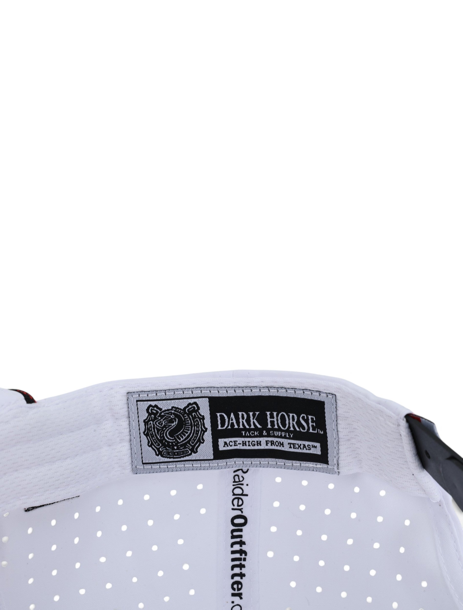 Inside the white Texas Tech cap showing the Dark Horse Tack and Supply label on the sweatband