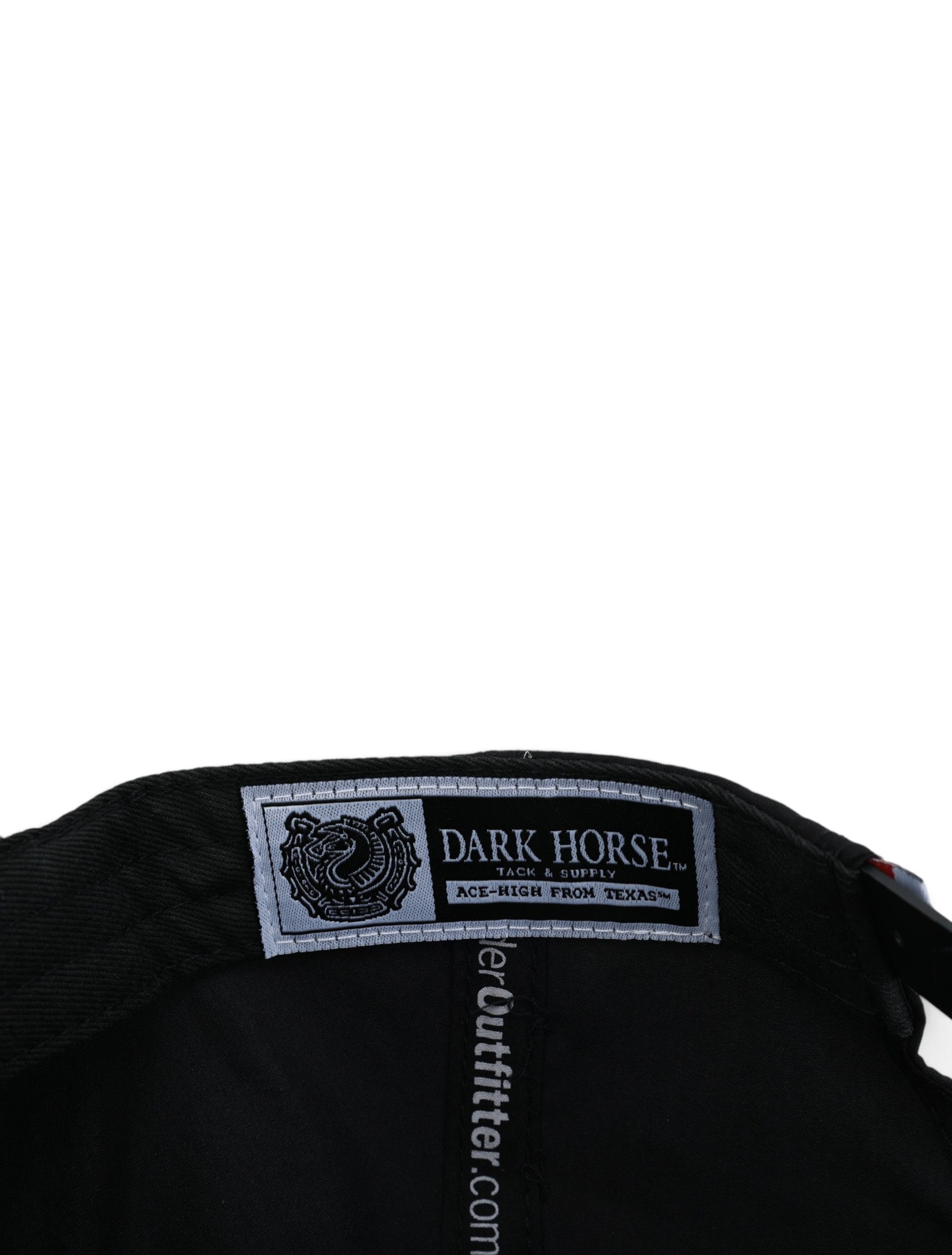 Inside the black Texas Tech cap showing the Dark Horse Tack and Supply label on the sweatband
