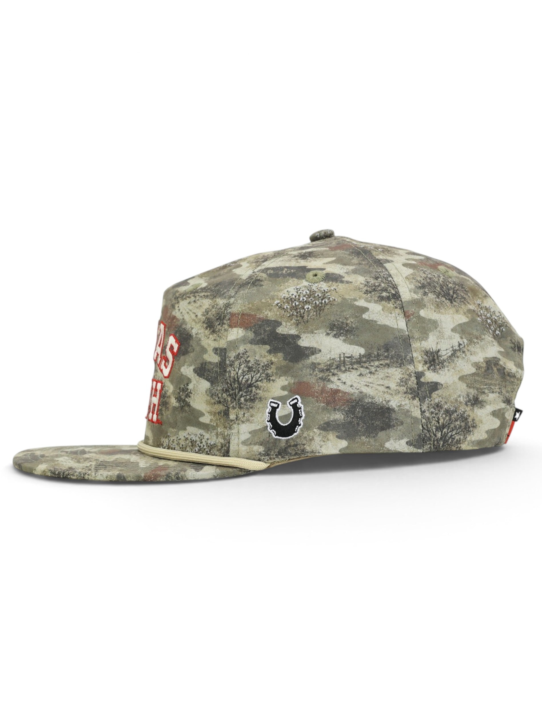 Opposite side of the camo Texas Tech cap showing the Dark Horse horseshoe on the panel