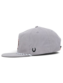 Side view of the Texas Tech Guns Up grey vintage cap showing the Dark Horse horseshoe embroidered on the side panel