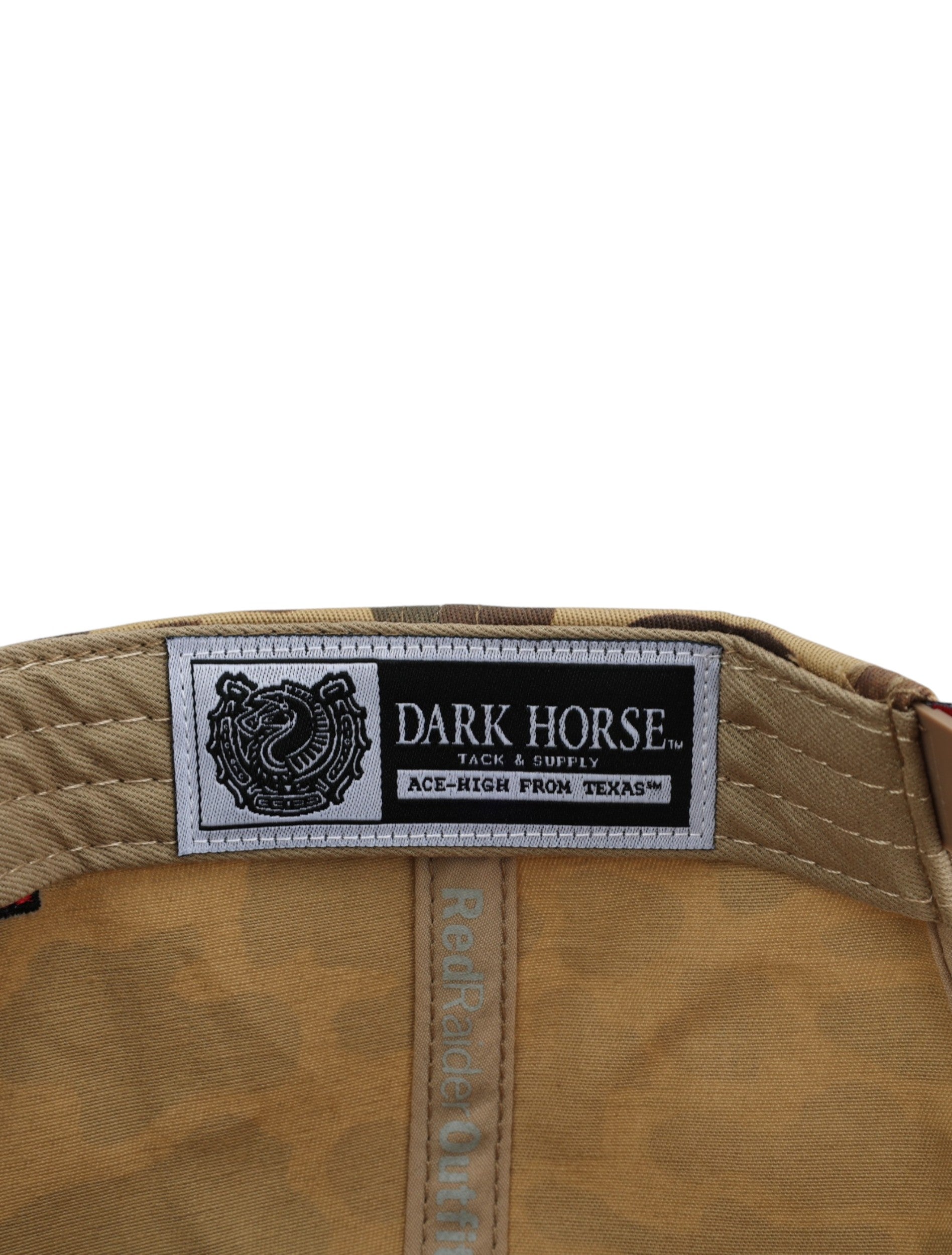 Inside the camo Texas Tech cap showing the Dark Horse Tack and Supply label on the sweatband