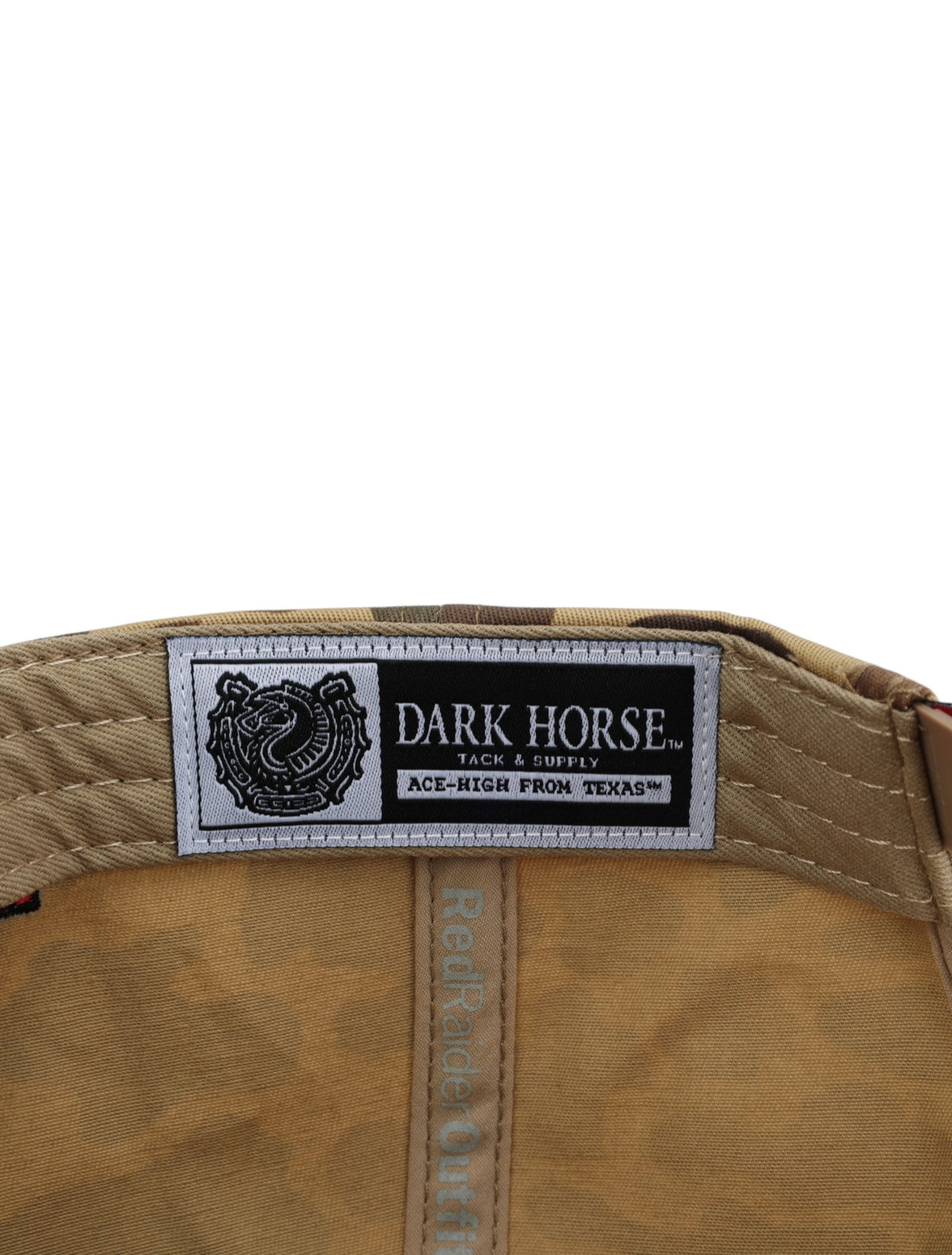 Inside the camo Texas Tech cap showing the Dark Horse Tack and Supply label on the sweatband