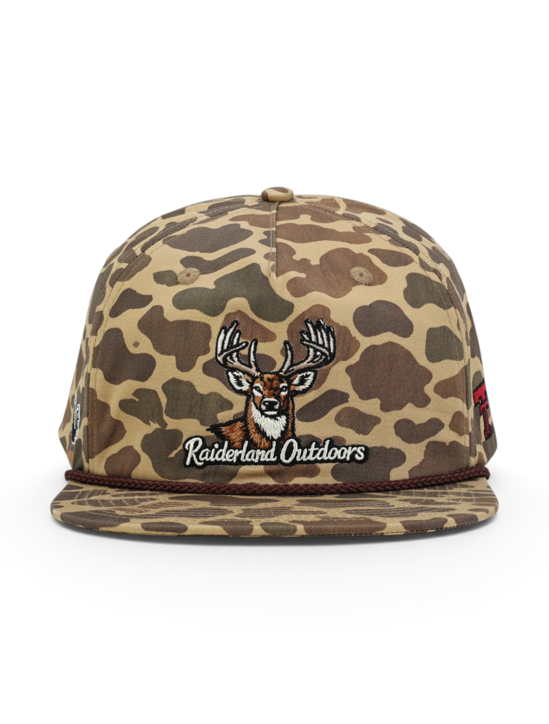 Front of the camo Texas Tech cap showing the embroidered whitetail buck above Raiderland Outdoors in white script