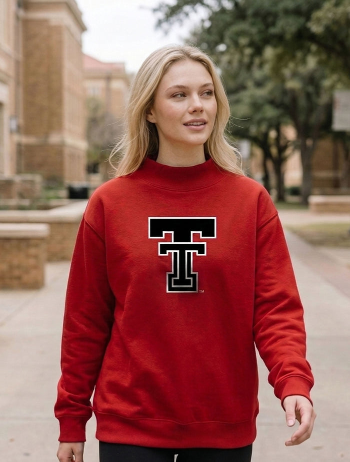 Model wearing the red Dark Horse Texas Tech “Vault Double T” Mock Neck with a black outlined Double T on the chest